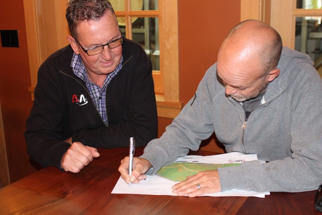 Mark Sylvester of ASAP Geomatix and Layne Craig, Owner of 40 Knots Vineyard and Estate Winery reviewing the data from the pilot project