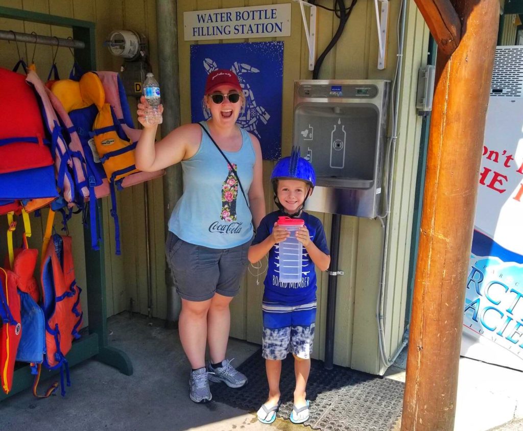 guests at the Lakeside Resort in Oliver, BC using a water bottle refill station instead of using single-use plastic water bottles