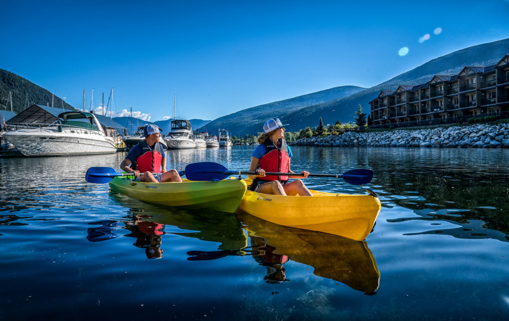 kayakers in the bay by the Prestige Hotel in British Columbia